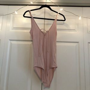 Billabong - pink bodysuit (size M)